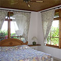  Villa Kompiang - Frangipani Bungalow Schlafzimmer 